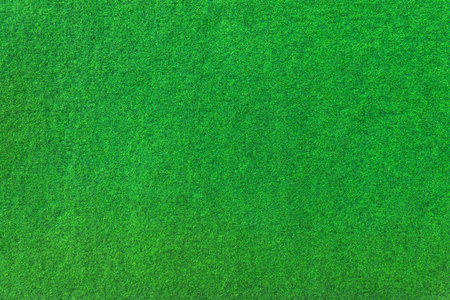 Closeup of green outdoor carpet that mimics artificial turfの写真素材