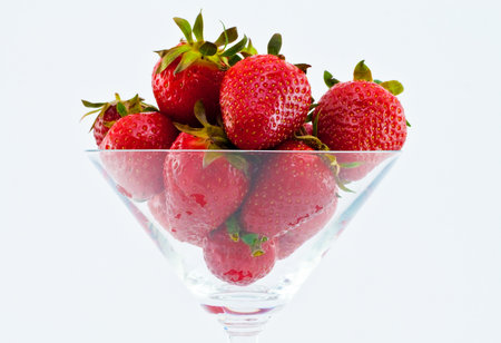 Heatlhy red strawberries isolated on white backgroundの写真素材