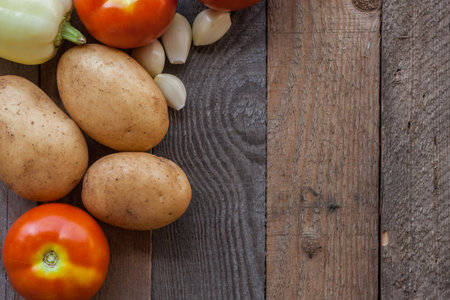 Close-up of fresh vegetables on a wooden tableの写真素材