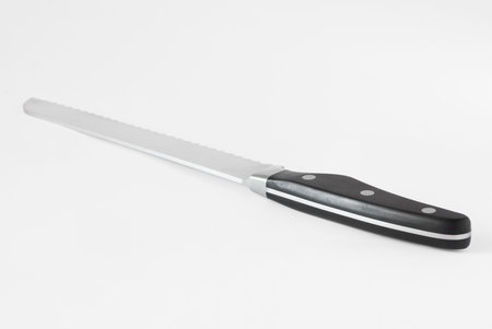 Bread knife on white 