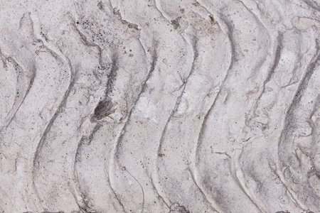 Background  Concrete with Diagonal Pattern  A closeup of dried concrete with diagonal ridges   の写真素材
