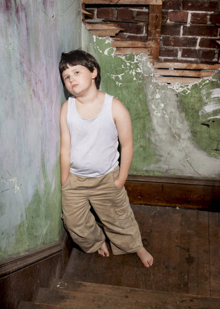 Boy in White Shirt and Khaki Pantsの写真素材