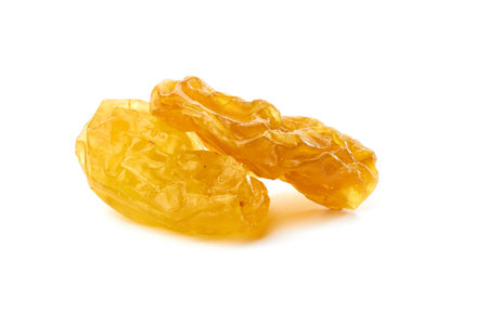 Two golden raisins on whiteの写真素材