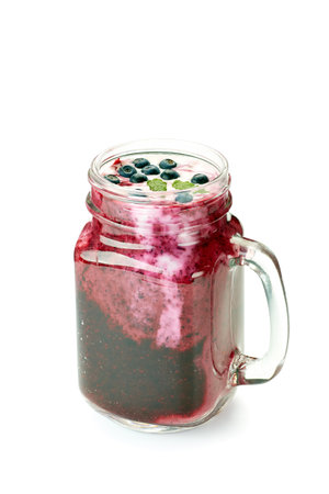 Jar of  blueberry smoothie on whiteの写真素材