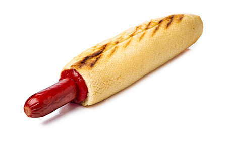 French hot dog with ketchup on white backgroundの写真素材