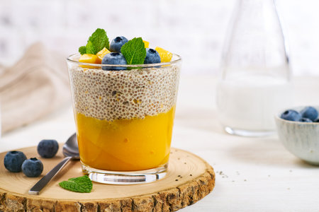 Healthy breakfast chia seeds pudding with mango pureeの写真素材