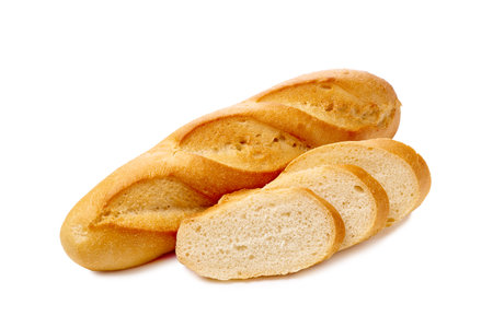 Fresh bread loaf and three slices on white backgroundの写真素材