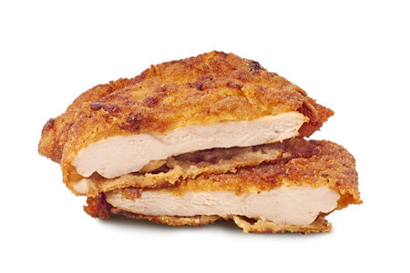 A Crispy Fried Chicken Cutlet Placed on a Clean White Background for Presentationの写真素材