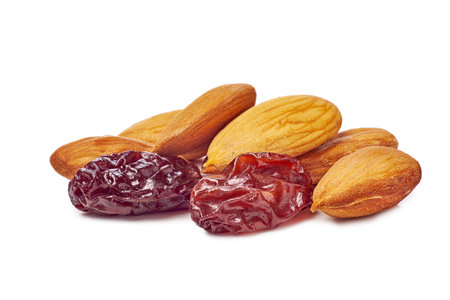 A delightful pile of dried raisins and almonds perfect for healthy snacking options and baking recipesの写真素材
