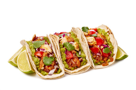 Enjoy the taste of Delicious Tacos made with Fresh Ingredients and served with Lime Slicesの写真素材