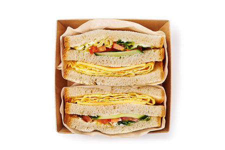 A Delicious Egg Sandwich made with Fresh Vegetables for any meal or occasion you desireの写真素材