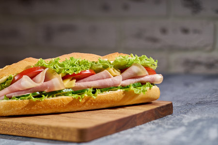 A mouthwatering and delicious Submarine Sandwich made with Fresh and high quality Ingredientsの写真素材