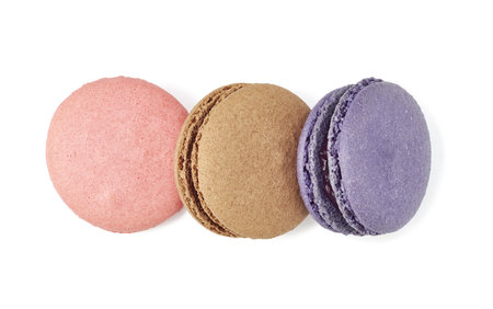 A Beautiful Collection of Colorful Assorted Macarons Displayed on a White Backgroundの写真素材