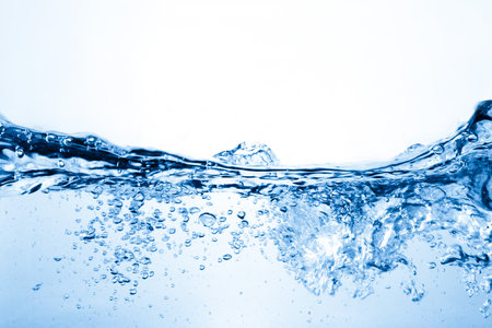 Water and air bubbles over white background