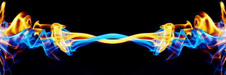 Abstract blue and yellow smoke with over black backgroundの写真素材