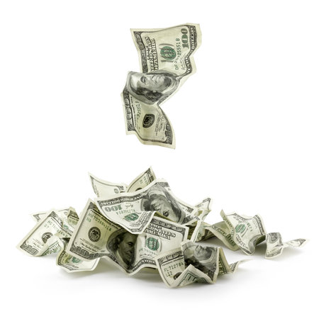 Pile of crumpled money dollar bills overs white の写真素材