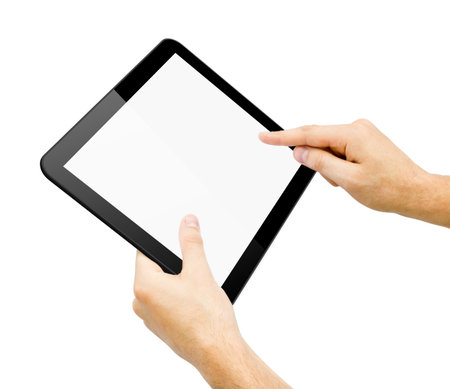 Black tablet pc in hands on white background. Portable computerの写真素材