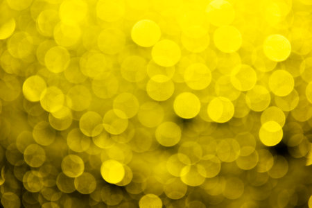 Natural yellow blur abstract bokeh background with selective focusの写真素材