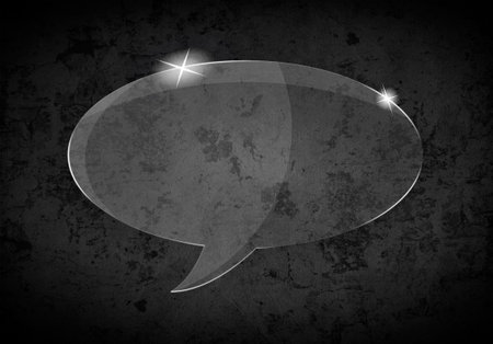 Shiny glass speech bubble in dark backgroundの写真素材