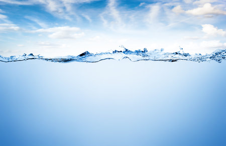Water and air bubbles over sky backgroundの写真素材
