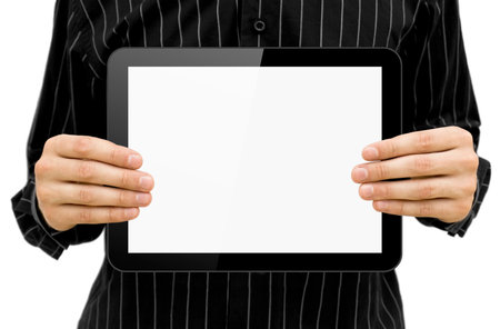 Black tablet pc in hands on white background. Portable computerの写真素材