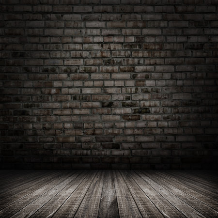 Dark room with tile floor and brick wall backgroundの写真素材