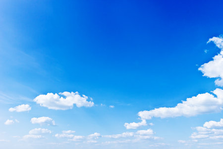 Blue sky with white clouds backgroundの写真素材
