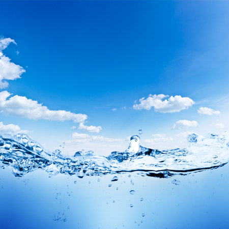 Water and air bubbles over sky の写真素材