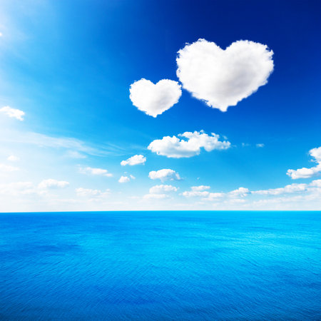 Blue sea under clouds sky with heart shape cloud backgroundの写真素材
