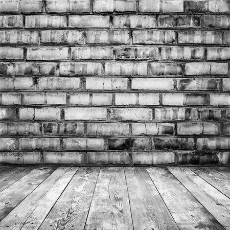 room interior vintage with brick wall and wood floor backgroundの写真素材