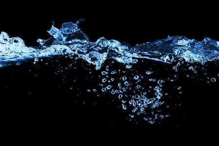 Water and air bubbles over black backgroundの写真素材