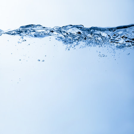 Water and air bubbles over white background with space for textの写真素材
