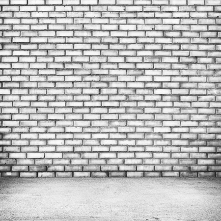 Bright room with tile floor and brick white wall backgroundの写真素材