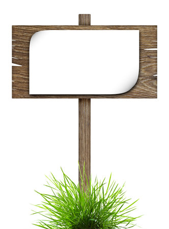 Road sign with sheet of paper in green grass isolated on a white backgroundの写真素材