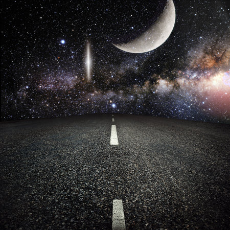 asphalted highway over night sky with stars background. Elements of this image furnished by NASAの写真素材