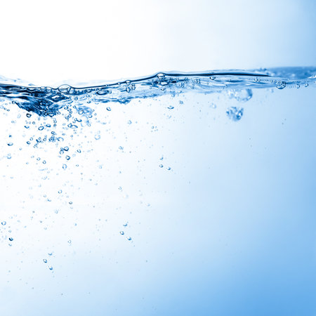Water and air bubbles over white background with space for text Water and air bubbles over white background with space for text