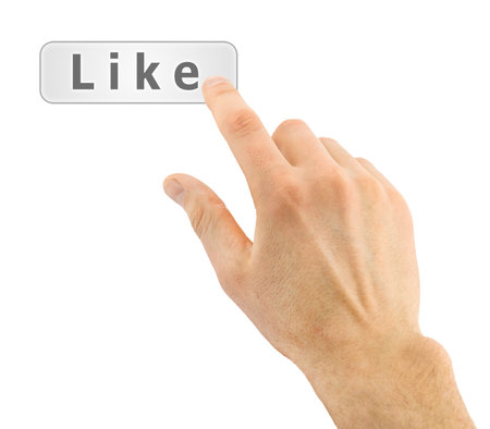 Hand pushing like button on white background
