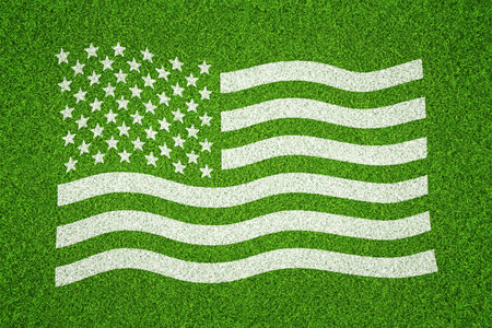 USA flag painted over grass backgroundの写真素材