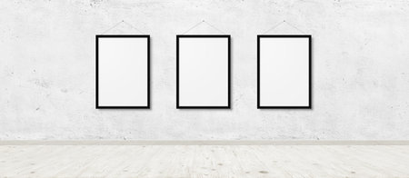 Vintage room interior with three photo frames over white brick wall and wood floor backgroundの写真素材