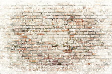 The brick wall texture with snow flakes over it. Winter backgroundの写真素材