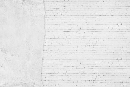 Old white brick stones wall backgroundの写真素材