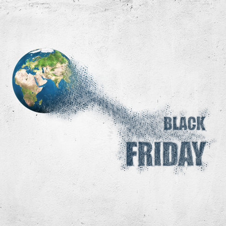 World disintegrate in a small parts and flying into words Black Friday. Commerce concept.の写真素材