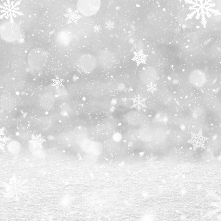 White snowflakes and blured bokeh christmas backgroundの写真素材