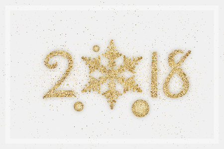 Golden glitter 2018 snowflake over white background. Holiday cardの写真素材