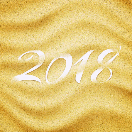2018 in sand background. Close-up of sand grainsの写真素材