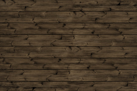 The dark wood texture with natural patterns backgroundの写真素材