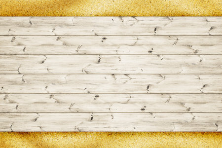 Wood planks board is over sand backgroundの写真素材