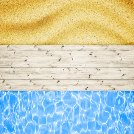 Wood planks board is over sand and sea backgroundの写真素材