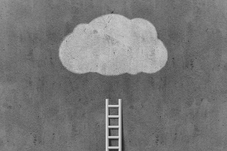 Blank concrete grey wall with ladder and cloud backgroundの写真素材