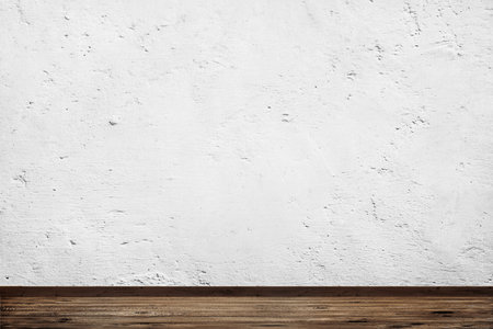room interior vintage with white concrete wall and wood floor backgroundの写真素材